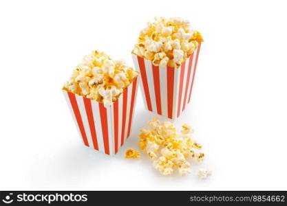 Two red white striped carton buckets with tasty cheese popcorn, isolated on white background. Movies, cinema and entertainment concept.