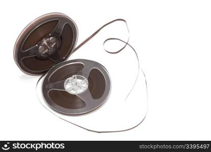 two reels for last centurys tape recorder against white background
