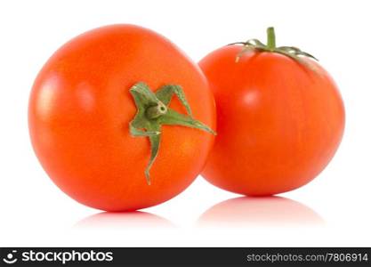 two ripe tomatoes with reflection on white background