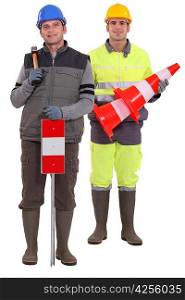 Two road workers stood together