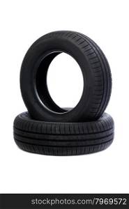 Two rubber car tire side view. Studio. Isolate on white.