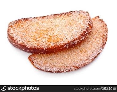 two rusks in sugar side isolated on white