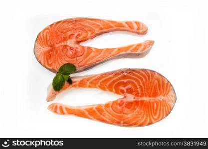 Two salmon fish cutlets isolated on white background