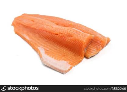 two salmon trout fillets over white background