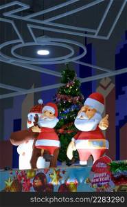 Two Santa Claus dolls and Christmas decorations with lighting display inside of department store during Christmas festival