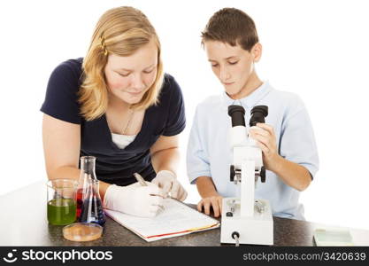 Two school children learning about science. Isolated on white.