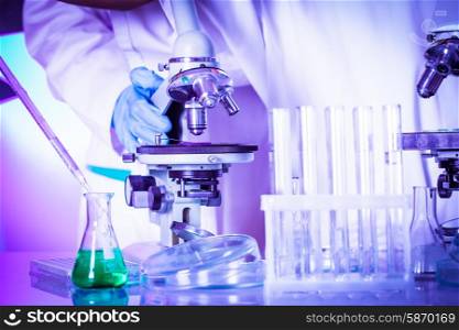 Two scientists in the chemical laboratory are doing experiments. scientists in the chemical laboratory
