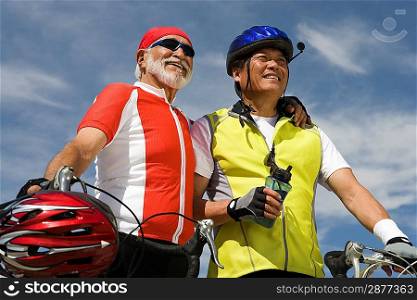Two Senior men with bikes