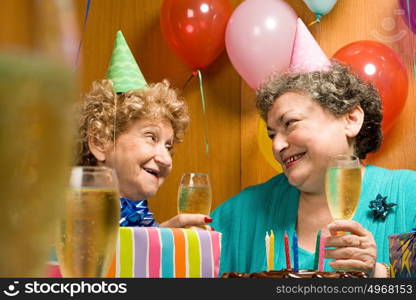 Two senior women at a party