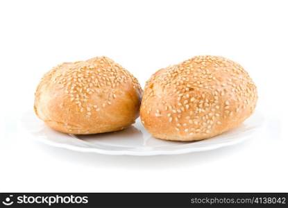 Two sesame buns isolated on white background