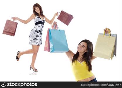 Two shopping young girls a over white background