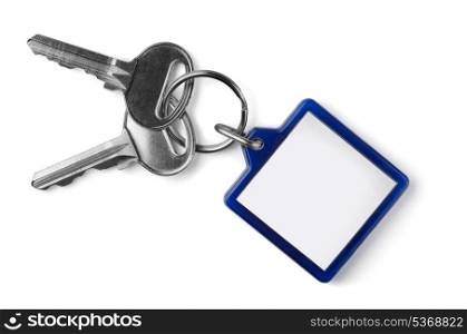 Two silver keys with blank key fob isolated on white