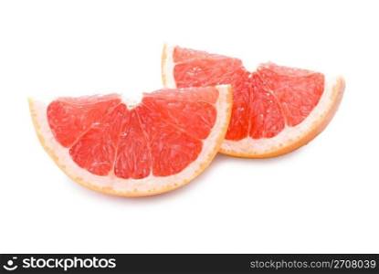 Two slices of grapefruit on white background, isolated fruit.