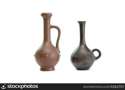 Two small elegant jugs isolated