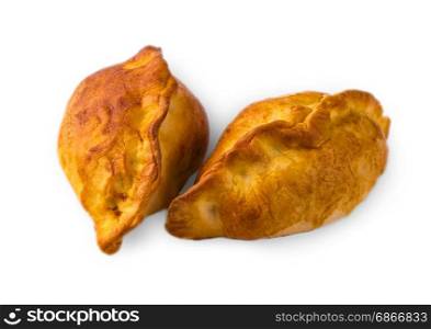 Two Small pies with stuffing pn white background