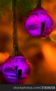 Two Small Purple Bells on Christmas Tree