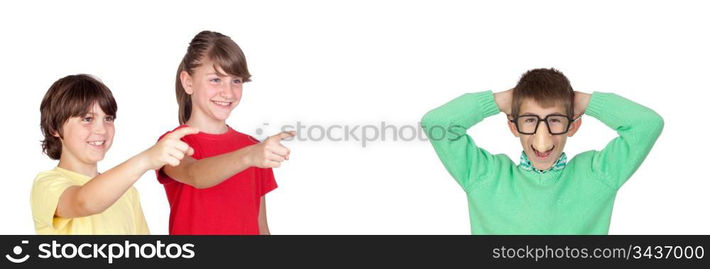 Two smiled children pointing a funny boy isolated on white background