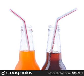 Two soda bottles with straws isolated over white