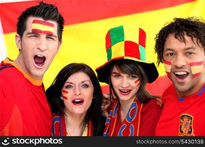 Two Spanish couples supporting their national team