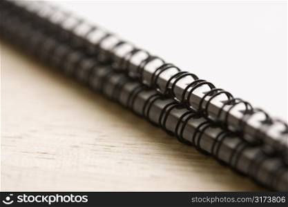 Two spiral bound notebooks with selective focus.