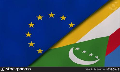 Two states flags of European Union and Comoros. High quality business background. 3d illustration. The flags of European Union and Comoros. News, reportage, business background. 3d illustration