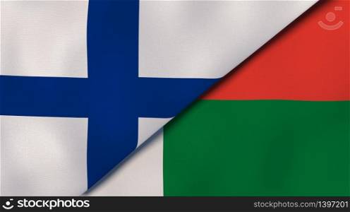 Two states flags of Finland and Madagascar. High quality business background. 3d illustration. The flags of Finland and Madagascar. News, reportage, business background. 3d illustration