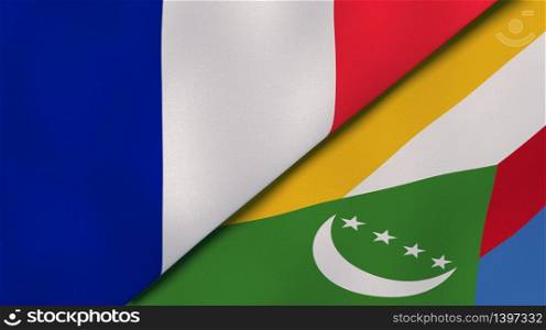 Two states flags of France and Comoros. High quality business background. 3d illustration. The flags of France and Comoros. News, reportage, business background. 3d illustration