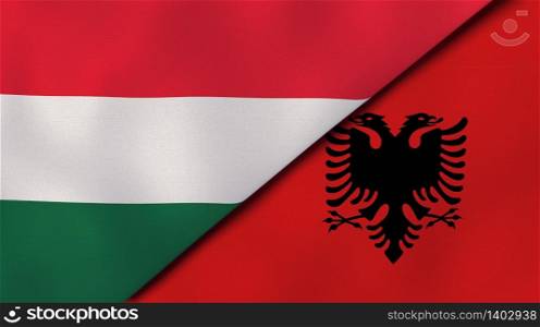 Two states flags of Hungary and Albania. High quality business background. 3d illustration. The flags of Hungary and Albania. News, reportage, business background. 3d illustration