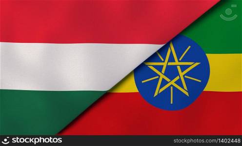 Two states flags of Hungary and Ethiopia. High quality business background. 3d illustration. The flags of Hungary and Ethiopia. News, reportage, business background. 3d illustration
