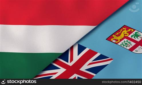 Two states flags of Hungary and Fiji. High quality business background. 3d illustration. The flags of Hungary and Fiji. News, reportage, business background. 3d illustration