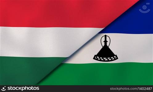 Two states flags of Hungary and Lesotho. High quality business background. 3d illustration. The flags of Hungary and Lesotho. News, reportage, business background. 3d illustration