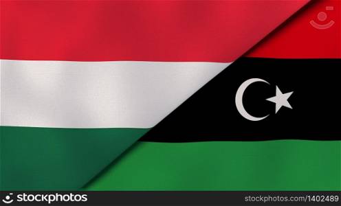 Two states flags of Hungary and Libya. High quality business background. 3d illustration. The flags of Hungary and Libya. News, reportage, business background. 3d illustration