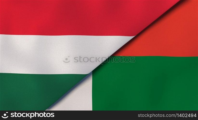 Two states flags of Hungary and Madagascar. High quality business background. 3d illustration. The flags of Hungary and Madagascar. News, reportage, business background. 3d illustration