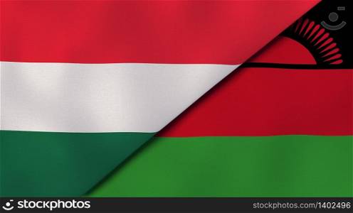 Two states flags of Hungary and Malawi. High quality business background. 3d illustration. The flags of Hungary and Malawi. News, reportage, business background. 3d illustration