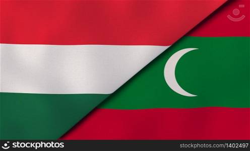 Two states flags of Hungary and Maldives. High quality business background. 3d illustration. The flags of Hungary and Maldives. News, reportage, business background. 3d illustration
