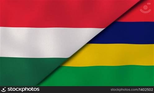Two states flags of Hungary and Mauritius. High quality business background. 3d illustration. The flags of Hungary and Mauritius. News, reportage, business background. 3d illustration
