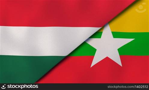 Two states flags of Hungary and Myanmar. High quality business background. 3d illustration. The flags of Hungary and Myanmar. News, reportage, business background. 3d illustration