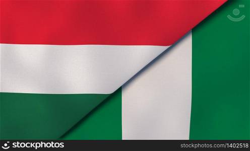 Two states flags of Hungary and Nigeria. High quality business background. 3d illustration. The flags of Hungary and Nigeria. News, reportage, business background. 3d illustration