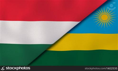 Two states flags of Hungary and Rwanda. High quality business background. 3d illustration. The flags of Hungary and Rwanda. News, reportage, business background. 3d illustration