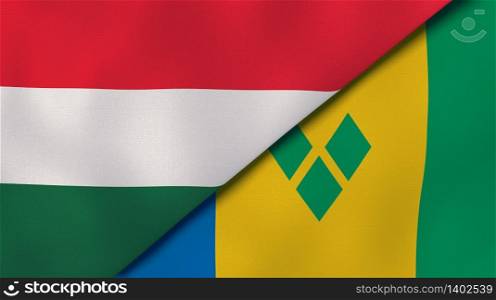 Two states flags of Hungary and Saint Vincent and Grenadines. High quality business background. 3d illustration. The flags of Hungary and Saint Vincent and Grenadines. News, reportage, business background. 3d illustration
