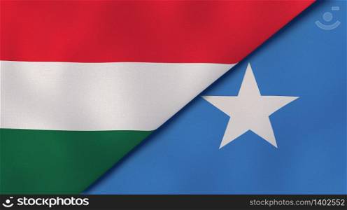 Two states flags of Hungary and Somalia. High quality business background. 3d illustration. The flags of Hungary and Somalia. News, reportage, business background. 3d illustration