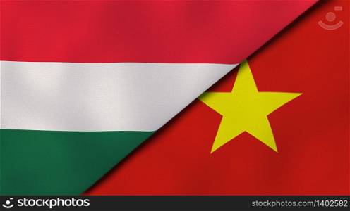 Two states flags of Hungary and Vietnam. High quality business background. 3d illustration. The flags of Hungary and Vietnam. News, reportage, business background. 3d illustration