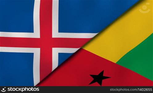 Two states flags of Iceland and Guinea Bissau. High quality business background. 3d illustration. The flags of Iceland and Guinea Bissau. News, reportage, business background. 3d illustration
