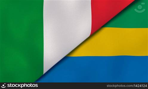 Two states flags of Italy and Gabon. High quality business background. 3d illustration. The flags of Italy and Gabon. News, reportage, business background. 3d illustration