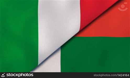 Two states flags of Italy and Madagascar. High quality business background. 3d illustration. The flags of Italy and Madagascar. News, reportage, business background. 3d illustration