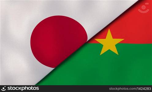 Two states flags of Japan and Burkina Faso. High quality business background. 3d illustration. The flags of Japan and Burkina Faso. News, reportage, business background. 3d illustration