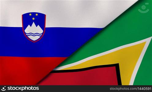 Two states flags of Slovenia and Guyana. High quality business background. 3d illustration. The flags of Slovenia and Guyana. News, reportage, business background. 3d illustration