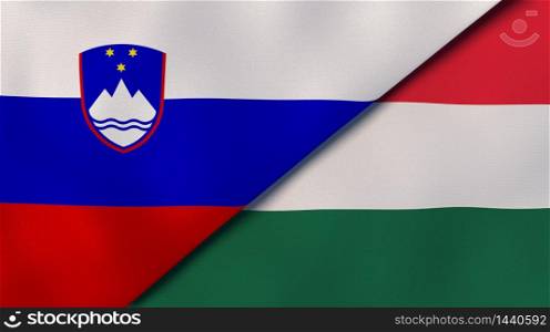 Two states flags of Slovenia and Hungary. High quality business background. 3d illustration. The flags of Slovenia and Hungary. News, reportage, business background. 3d illustration