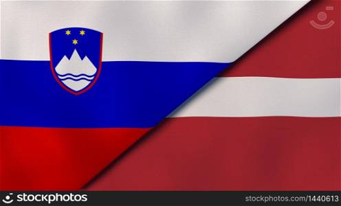 Two states flags of Slovenia and Latvia. High quality business background. 3d illustration. The flags of Slovenia and Latvia. News, reportage, business background. 3d illustration