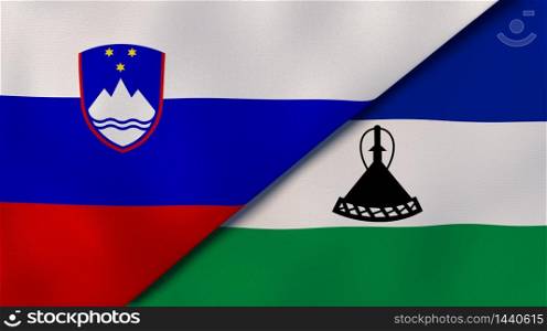 Two states flags of Slovenia and Lesotho. High quality business background. 3d illustration. The flags of Slovenia and Lesotho. News, reportage, business background. 3d illustration